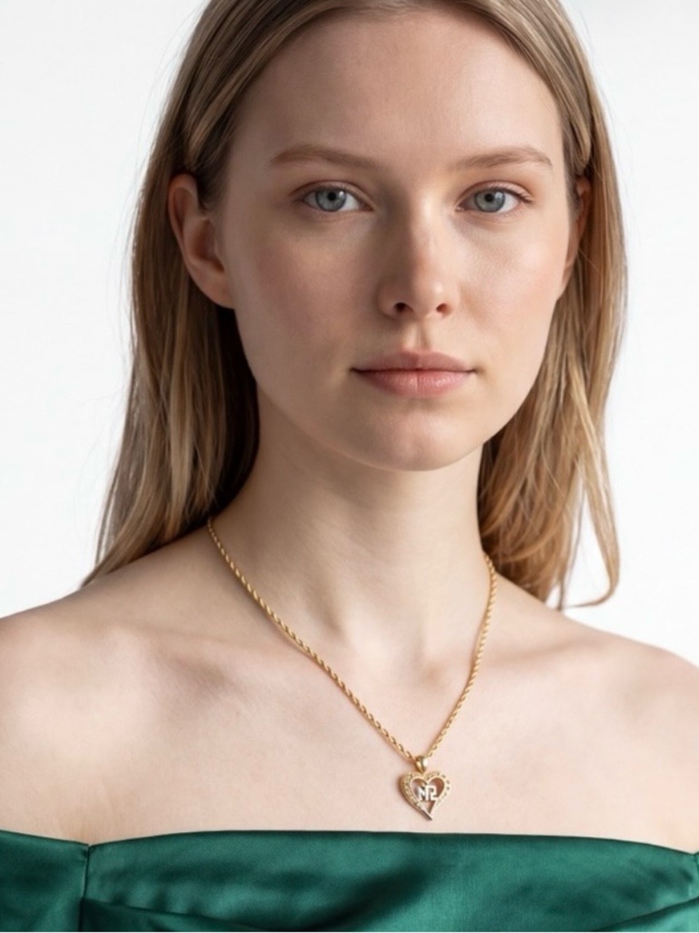 Nina Ricci Gold Heart Pendant Necklace with Chain